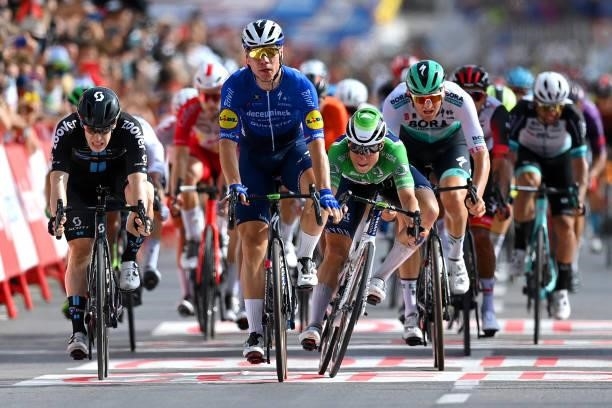 Fabio Jakobsen of Netherlands and Team Deceuninck - Quick-Step sprints to win ahead of Alberto Dainese of Italy and Team DSM and Jasper Philipsen of...