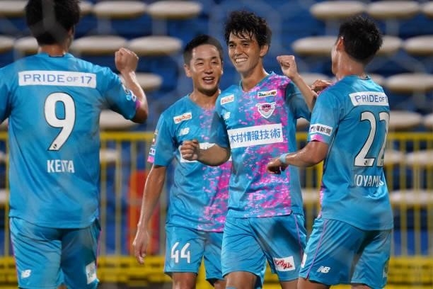 Tomoya Koyamatsu of Sagan Tosu celebrates scoring his side's third goal during the J.League Meiji Yasuda J1 match between Kashiwa Reysol and Sagan...
