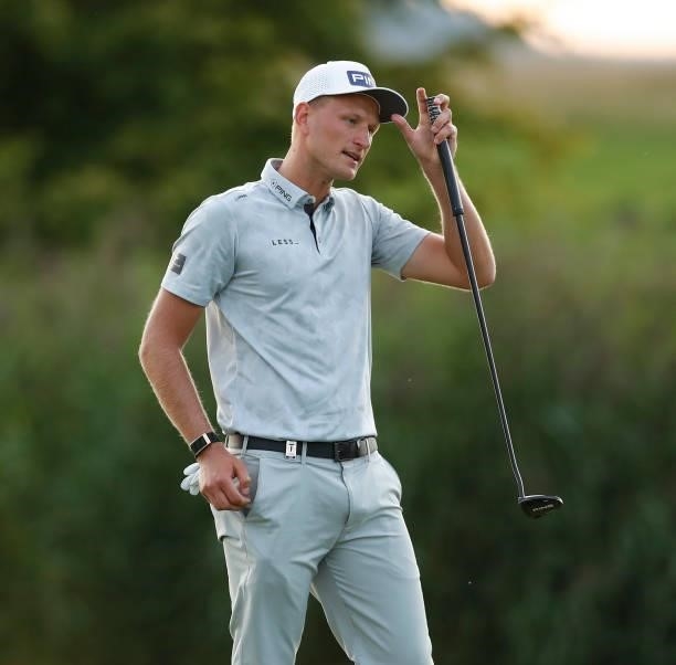 Adrian Meronk of Poland on the 18th hole during Day Three of The D+D Real Czech Masters at Albatross Golf Resort on August 21, 2021 in Prague, Czech...