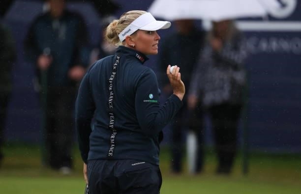 Nanna Koerstz Madsen of Denmark waves to the crowd on the eighteenth green during Day Three of the AIG Women's Open at Carnoustie Golf Links on...