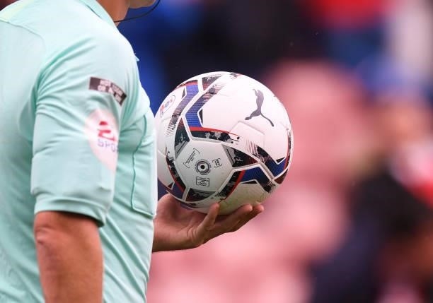 Referee Oliver Langford carries the match ball during the Sky Bet Championship match between Stoke City and Nottingham Forest at Bet365 Stadium on...