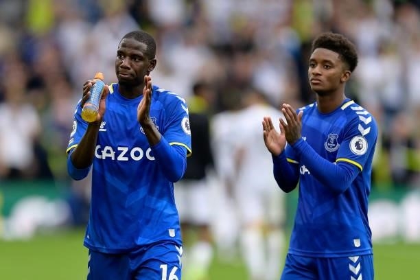 Abdoulaye Doucoure and Demarai Gray applaud after the Premier League match between Leeds United and Everton at Elland Road on August 21 2021 in...