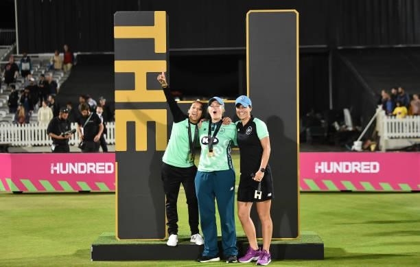 Shabnim Ismail, Dane van Niekerk and Marizanne Kapp of Oval Invincibles Women celebrate following The Hundred Final match between Southern Brave...