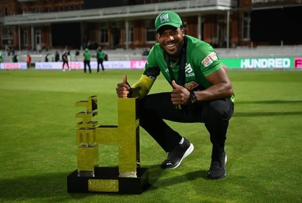 Chris Jordan of Southern Brave Men poses with The Men's Hundred Trophy following The Hundred Final match between Birmingham Phoenix Men and Southern...