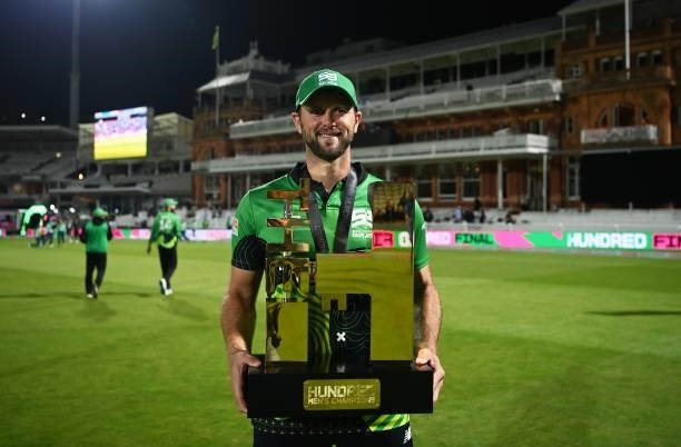Ross Whiteley of Southern Brave Men poses with The Men's Hundred Trophy following The Hundred Final match between Birmingham Phoenix Men and Southern...