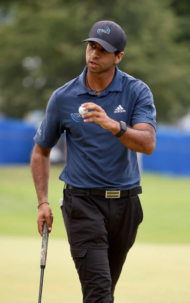 Aaron Rai of England acknowledges the gallery after sinking his birdie putt on the 16th hole during the round three of the Albertsons Boise Open at...