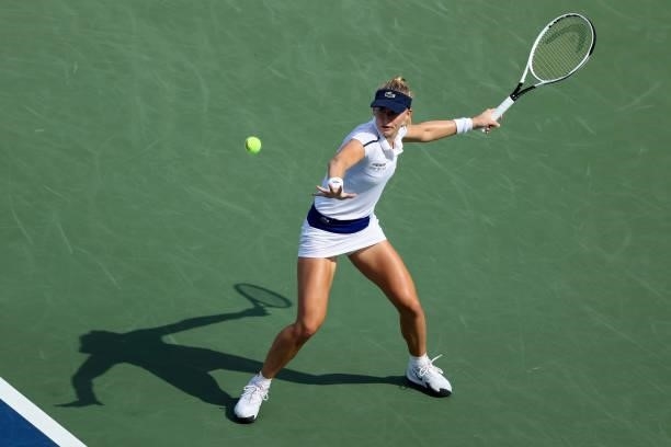 Jil Teichmann of Switzerland plays a forehand during her match against Karolina Pliskova of the Czech Republic during day 7 of the Western & Southern...