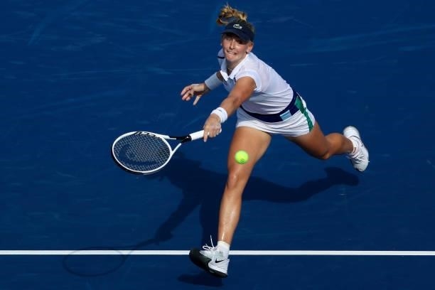 Jil Teichmann of Switzerland plays a backhand during her match against Karolina Pliskova of the Czech Republic during day 7 of the Western & Southern...