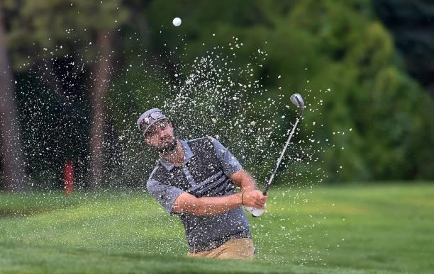 Tom Whitney hits out of the bunker on the first hole during the round three of the Albertsons Boise Open at Hillcrest Country Club on August 21, 2021...