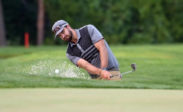 Tom Whitney hits out of the bunker on the first hole during the round three of the Albertsons Boise Open at Hillcrest Country Club on August 21, 2021...