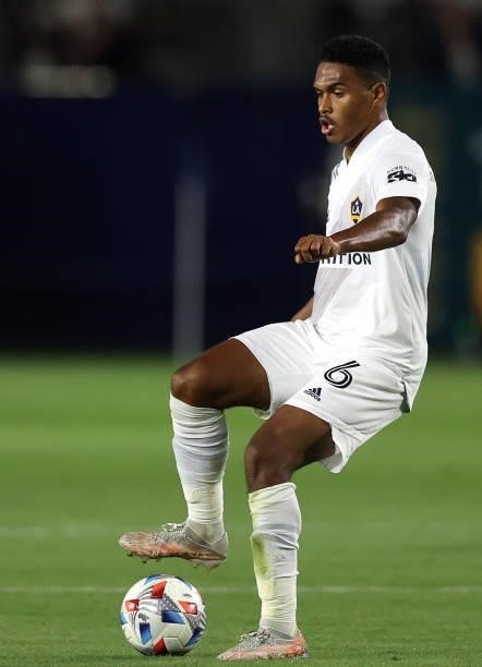 Rayan Raveloson of the Los Angeles Galaxy and Judson of San Jose Earthquakes in the first half at Dignity Health Sports Park on August 20, 2021 in...