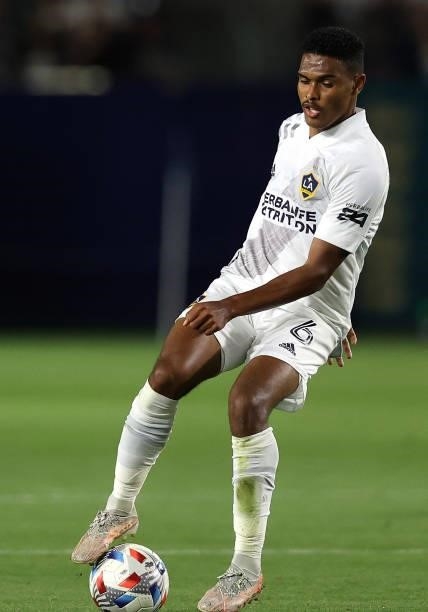 Rayan Raveloson of the Los Angeles Galaxy and Judson of San Jose Earthquakes in the first half at Dignity Health Sports Park on August 20, 2021 in...