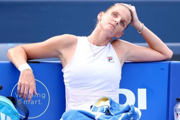 Karolina Pliskova of Czech Republic cools down on a changeover against Jill Teichmann of Switzerland during the semifinals of the Western & Southern...