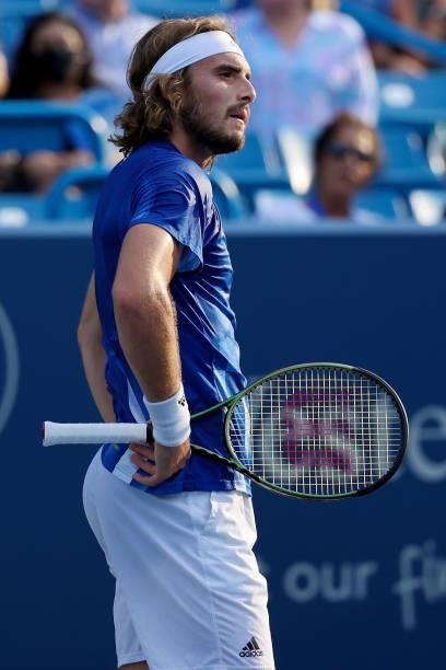 Stefanos Tsitsipas of Greece reacts after losing a point during his match against Alexander Zverev of Germany during Western & Southern Open - Day 7...