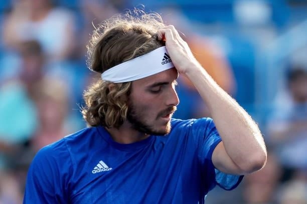 Stefanos Tsitsipas of Greece reacts after losing a point during his match against Alexander Zverev of Germany during Western & Southern Open - Day 7...