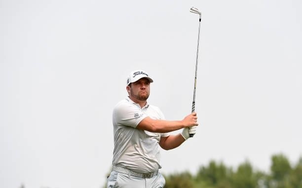 Ben Taylor of England hits his tee shot on the sixth hole during the round three of the Albertsons Boise Open at Hillcrest Country Club on August 21,...