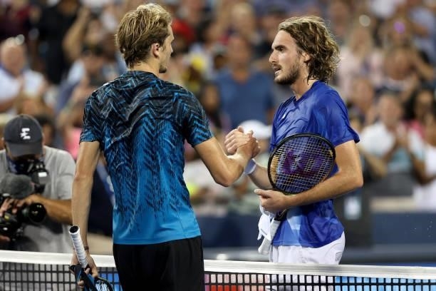 Alexander Zverev of Germany is congratulated at the net by Stefanos Tsitsipas of Greece during the semifinals of the Western & Southern Open at...