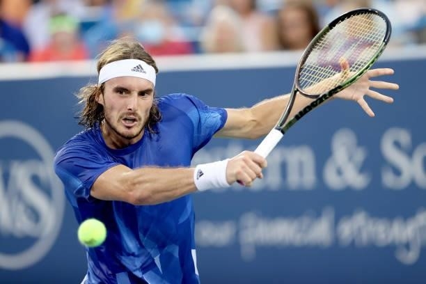 Stefanos Tsitsipas of Greece returns a shot to Alexander Zverev of Germany during the semifinals of the Western & Southern Open at Lindner Family...