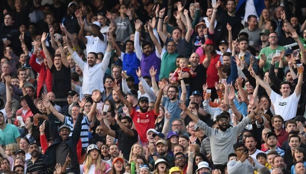Spectators celebrate a six during The Hundred Final match between Birmingham Phoenix Men and Southern Brave Men at Lord's Cricket Ground on August...