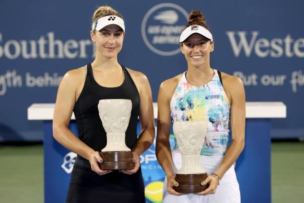 Gabriela Dabrowski of Canada and Luisa Stefani of Brazil pose with the runners-up trophy after losing to Samantha Stosur of Australia and Shuai Zhang...
