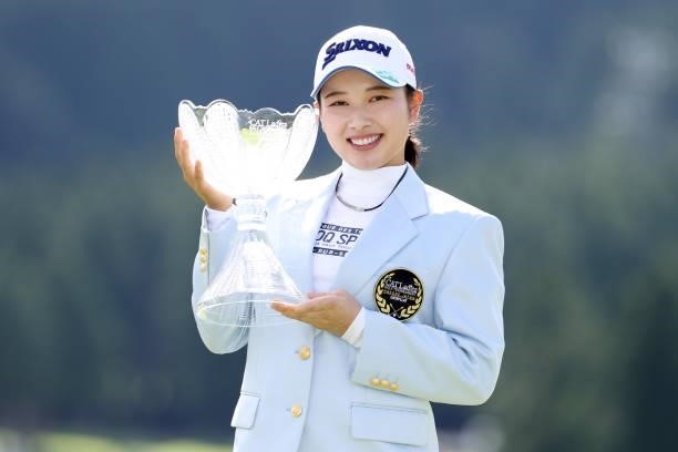 Sakura Koiwai of Japan poses with the trophy after winning the tournament following the final round of the CAT Ladies at Daihakone Country Club on...