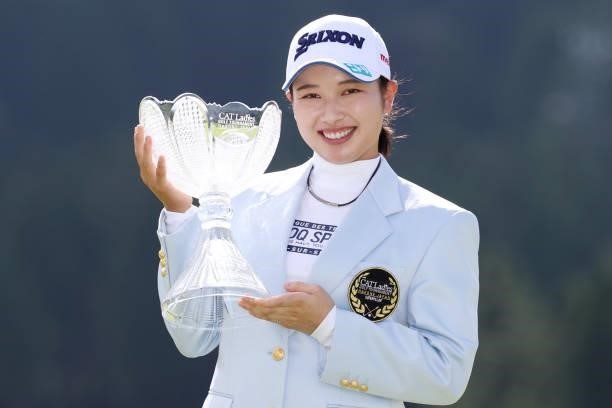 Sakura Koiwai of Japan poses with the trophy after winning the tournament following the final round of the CAT Ladies at Daihakone Country Club on...