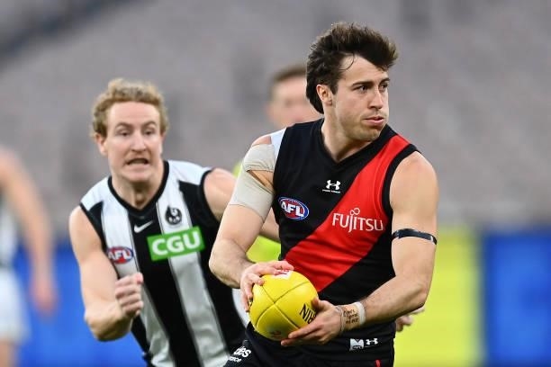 Andrew McGrath of the Bombers in action during the round 23 AFL match between Essendon Bombers and Collingwood Magpies Giants at Melbourne Cricket...