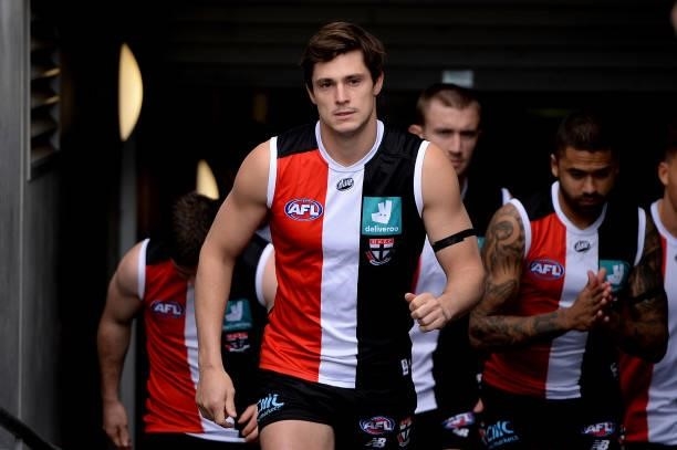 Jack Steele of the Saints leads out the team during the round 23 AFL match between St Kilda Saints and Fremantle Dockers at Blundstone Arena on...