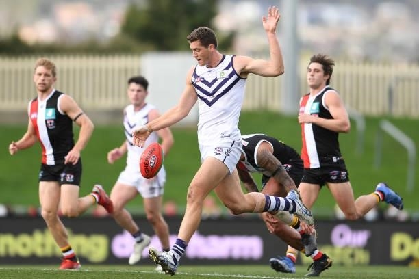 Lloyd Meek of the Dockers kicks the ball during the round 23 AFL match between St Kilda Saints and Fremantle Dockers at Blundstone Arena on August...