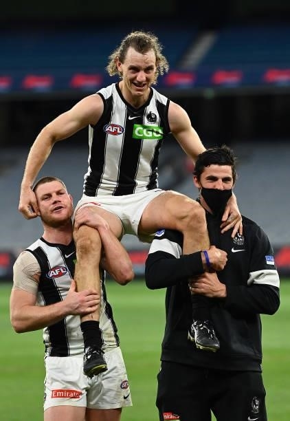 Chris Mayne of the Magpies is chaired from the field after his last game following the round 23 AFL match between Essendon Bombers and Collingwood...