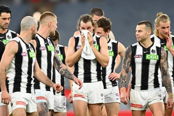 Chris Mayne of the Magpies shows his emotions as he leaves the field after his last game following the round 23 AFL match between Essendon Bombers...