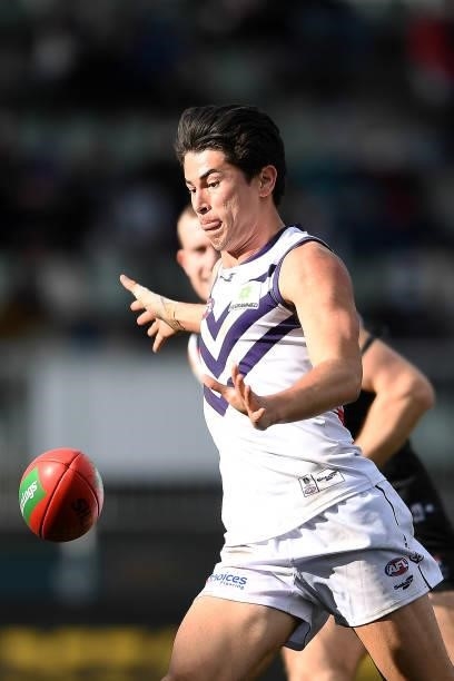 Bailey Banfield of the Dockers kicks the ball during the round 23 AFL match between St Kilda Saints and Fremantle Dockers at Blundstone Arena on...