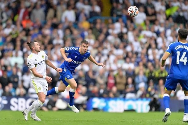 Seamus Coleman of Everton heads the ball clear during the Premier League match between Leeds United and Everton at Elland Road on August 21 2021 in...