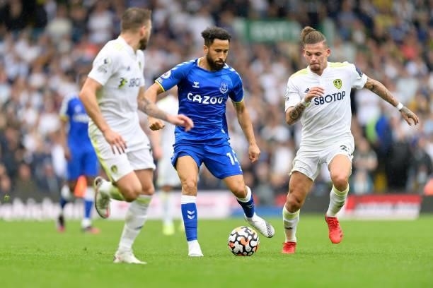 Andros Townsend of Everton and Kalvin Phillips of Leeds challenge for the ball during the Premier League match between Leeds United and Everton at...