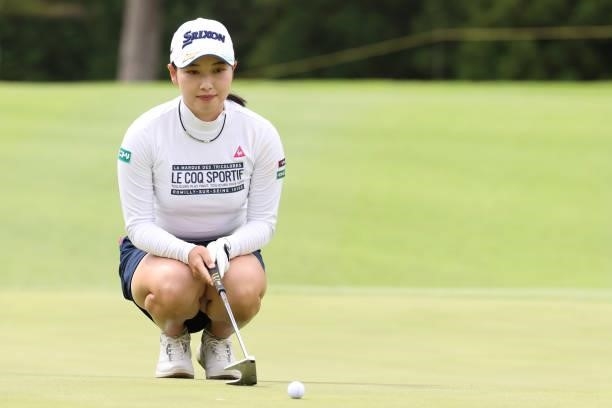 Sakura Koiwai of Japan lines up her putt on the 18th hole during the final round of the CAT Ladies at Daihakone Country Club on August 22, 2021 in...
