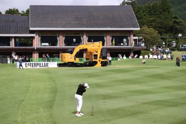 Mone Inami of Japan hits her third shot on the 18th hole during the final round of the CAT Ladies at Daihakone Country Club on August 22, 2021 in...