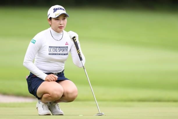 Sakura Koiwai of Japan lines up her putt on the 15th hole during the final round of the CAT Ladies at Daihakone Country Club on August 22, 2021 in...