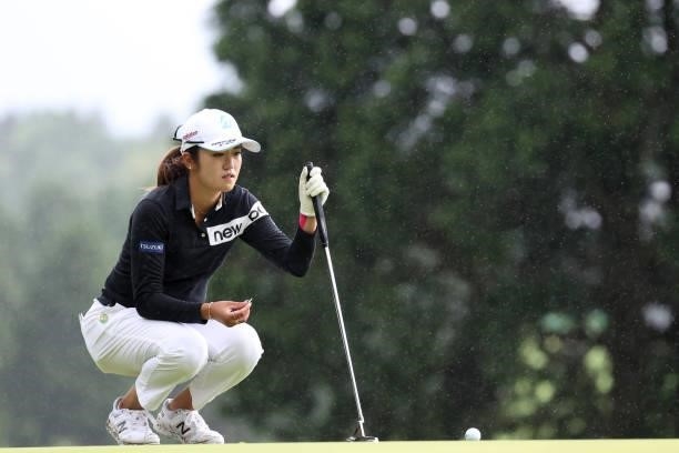 Mone Inami of Japan lines up her putt on the 8th hole during the final round of the CAT Ladies at Daihakone Country Club on August 22, 2021 in...