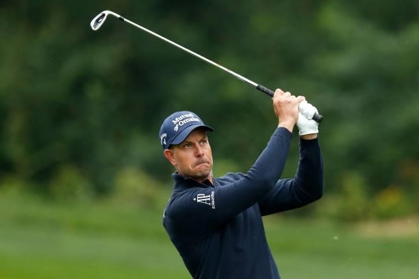 Henrik Stenson of Sweden plays a shot on the fourth hole during Day Four of The D+D Real Czech Masters at Albatross Golf Resort on August 22, 2021 in...