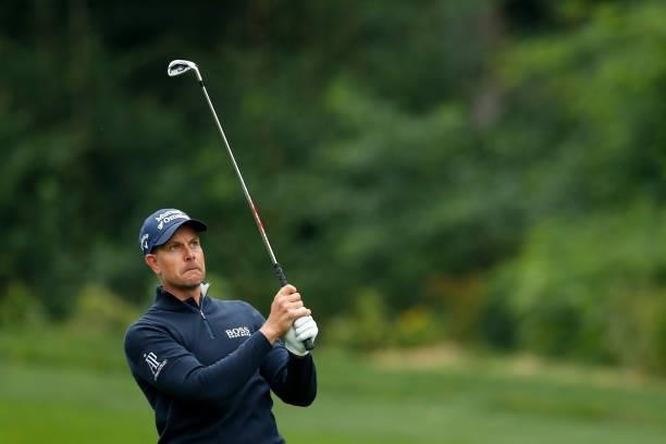 Henrik Stenson of Sweden plays a shot on the fourth hole during Day Four of The D+D Real Czech Masters at Albatross Golf Resort on August 22, 2021 in...