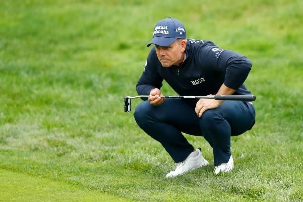 Henrik Stenson of Sweden lines up a putt on the fourth hole during Day Four of The D+D Real Czech Masters at Albatross Golf Resort on August 22, 2021...