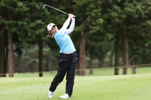 Mao Saigo of Japan hits her second shot on the 7th hole during the final round of the CAT Ladies at Daihakone Country Club on August 22, 2021 in...