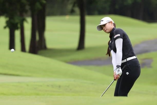 Asuka Kashiwabara of Japan chips on the 10th hole during the final round of the CAT Ladies at Daihakone Country Club on August 22, 2021 in Hakone,...