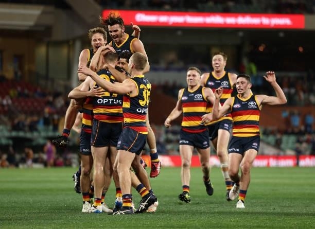 Tom Lynch of the Crows celebrates after kicking a goal during the round 23 AFL match between Adelaide Crows and North Melbourne Kangaroos at Adelaide...
