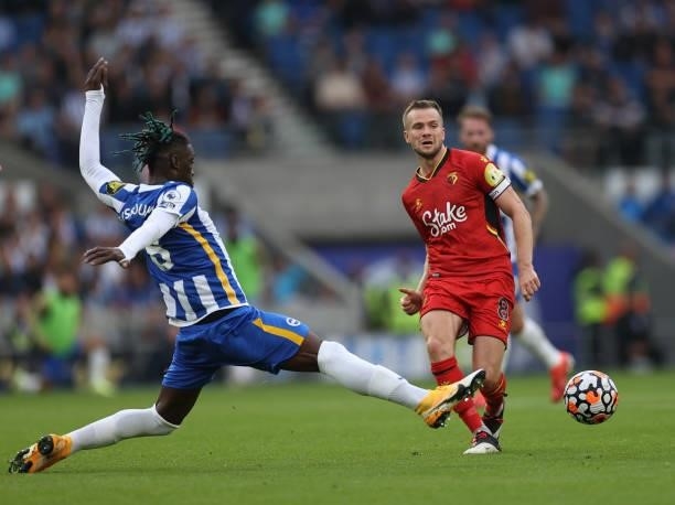 Tom Cleverley of Watford and Yves Bissouma of Brighton & Hove Albion in action during the Premier League match between Brighton & Hove Albion and...