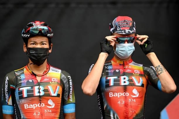 Yukiya Arashiro of Japan and Damiano Caruso of Italy and Team Bahrain Victorious during the team presentation prior to the 76th Tour of Spain 2021,...