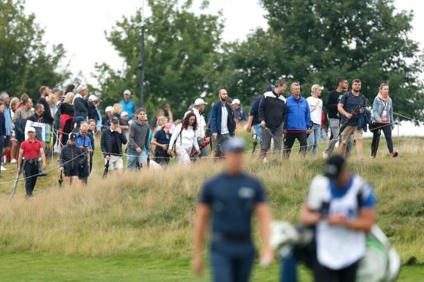 Fans watch on from the 14th hole as they follow Henrik Stenson of Sweden during Day Four of The D+D Real Czech Masters at Albatross Golf Resort on...