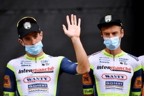 Riccardo Minali of Italy and Jan Hirt of Czech Republic and Team Intermarché - Wanty - Gobert Matériaux during the team presentation prior to the...