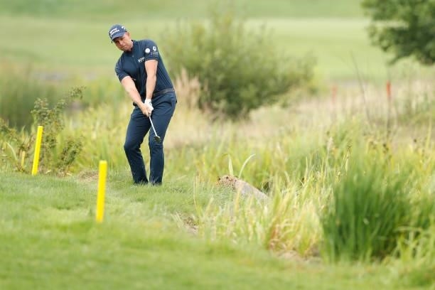 Henrik Stenson of Sweden plays a shot on the 16th hole during Day Four of The D+D Real Czech Masters at Albatross Golf Resort on August 22, 2021 in...