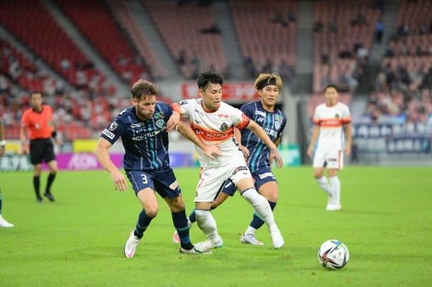 Of Avispa Fukuoka and Ryoya MORISHITA of Nagoya Grampus battle for the ball during the J.League Meiji Yasuda J1 match between Nagoya Grampus and...
